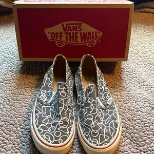 Men’s 6 or Woman’s 6.5 Vans Black and White Slip-On Sneakers